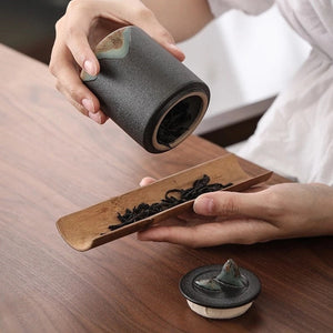 Black and white coffee canister acacuss