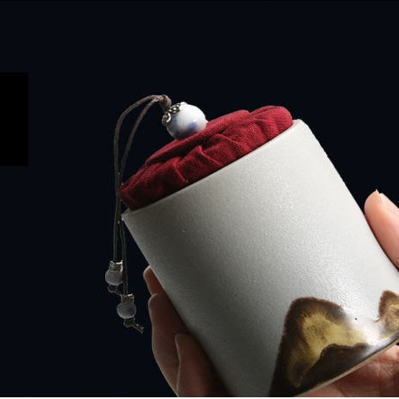 Black and white coffee canister acacuss