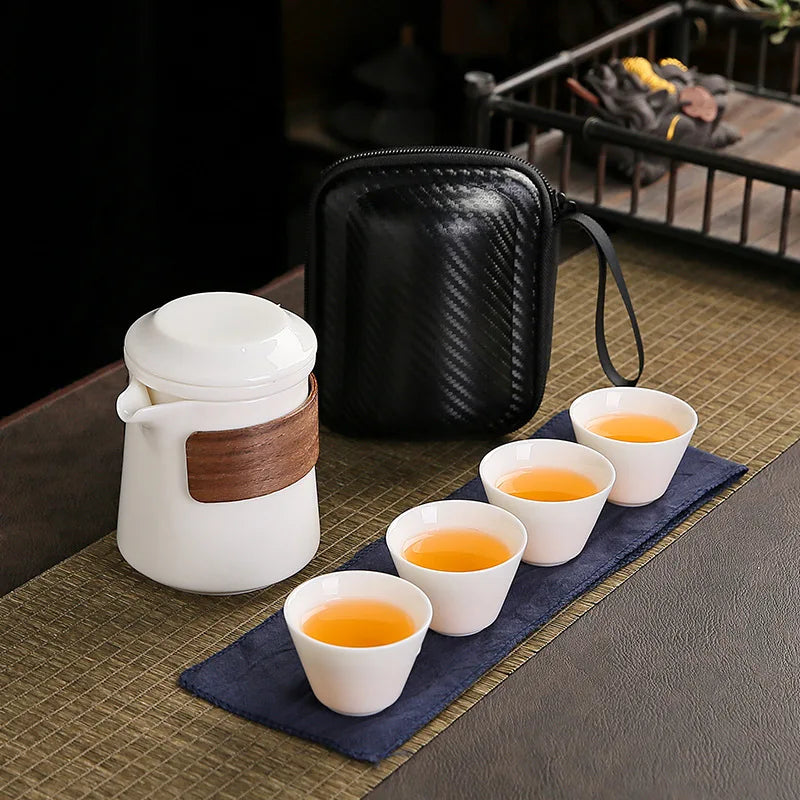 Dehua White Porcelain Travel Kung Fu Tea Set Carrying Bag Bowl Anti-scald Four 1 pot 4 Cup Gift Teacup Tea Set White Porcelain acacuss